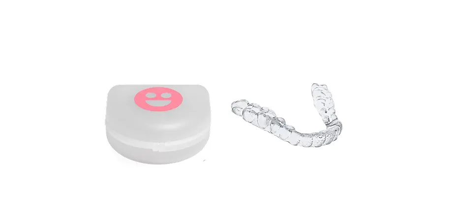 Clear mouthguard case with a pink smiley face and clear mouthguard on a white background